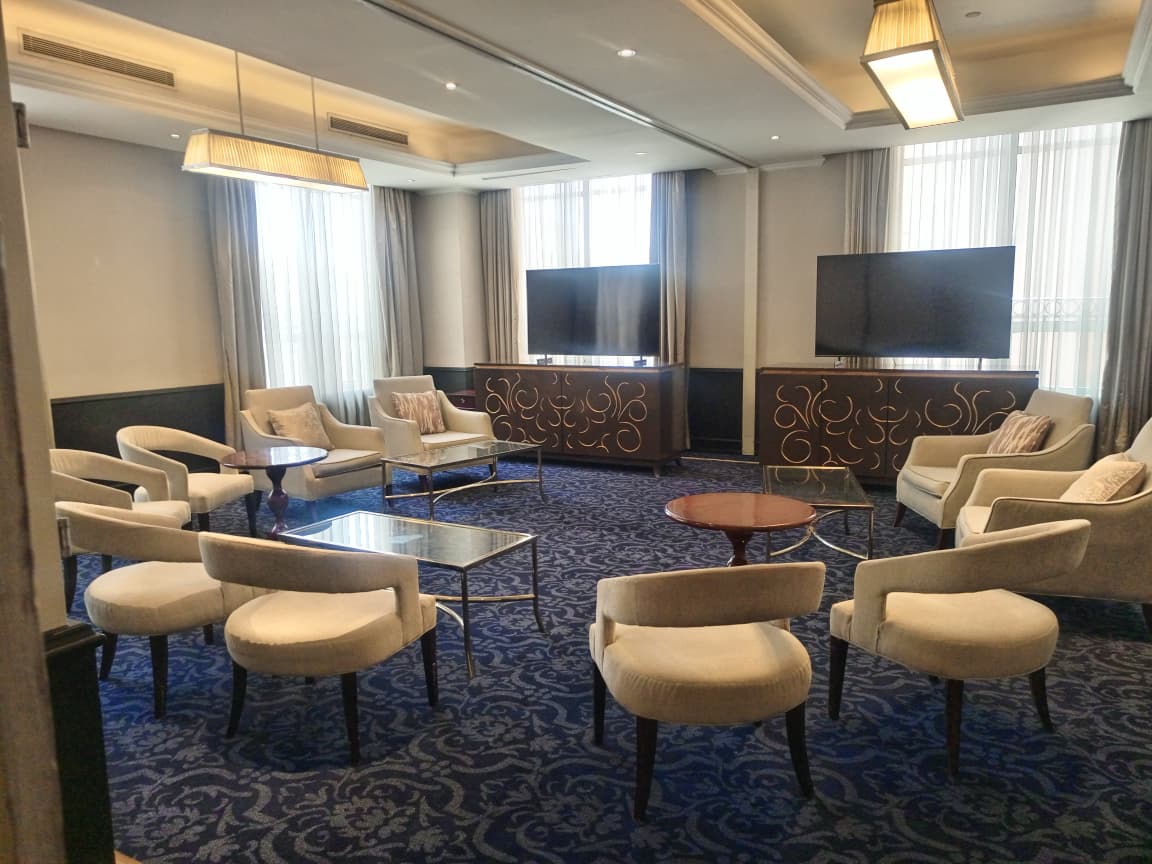 LTC breakout lounge with seating area and display screens